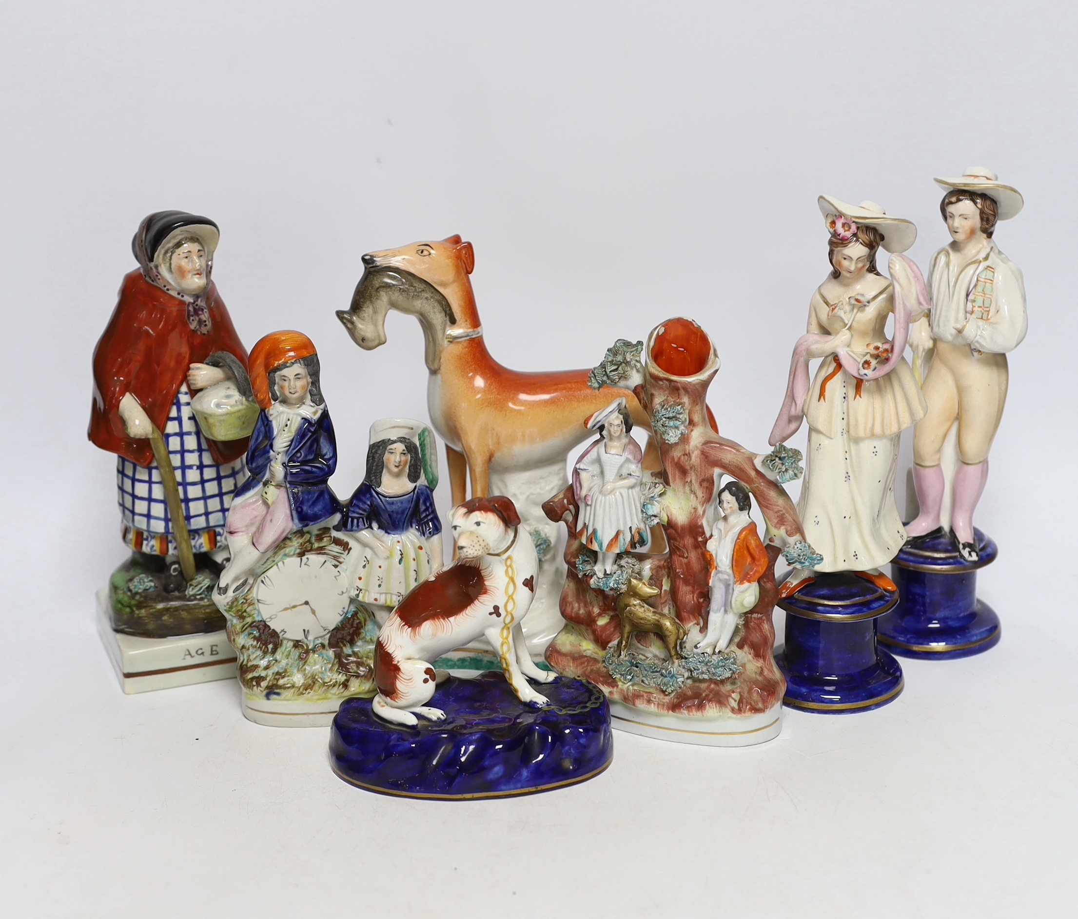 Seven mid 19th century Staffordshire pottery figures, tallest 22cm